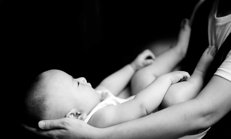 Baby won't sleep unless held? Here is a safe sleep environment to start the transition.