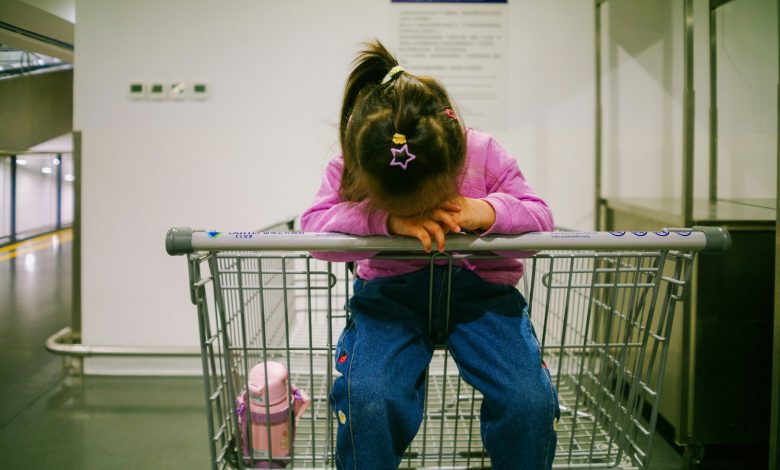 Toddler tantrums in a grocery store aisle