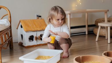 sensory play ideas for toddlers child playing with kinetic sand at home