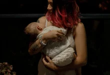 5 month old won't sleep unless held at night