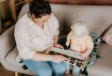 Baby sleep sounds help an infant fall asleep peacefully in a nursery.